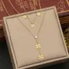 Multi-layer gold-plated glossy butterfly clover heart pendant, fashionable and niche design, stainless steel necklace, non-fading color necklace Specification image